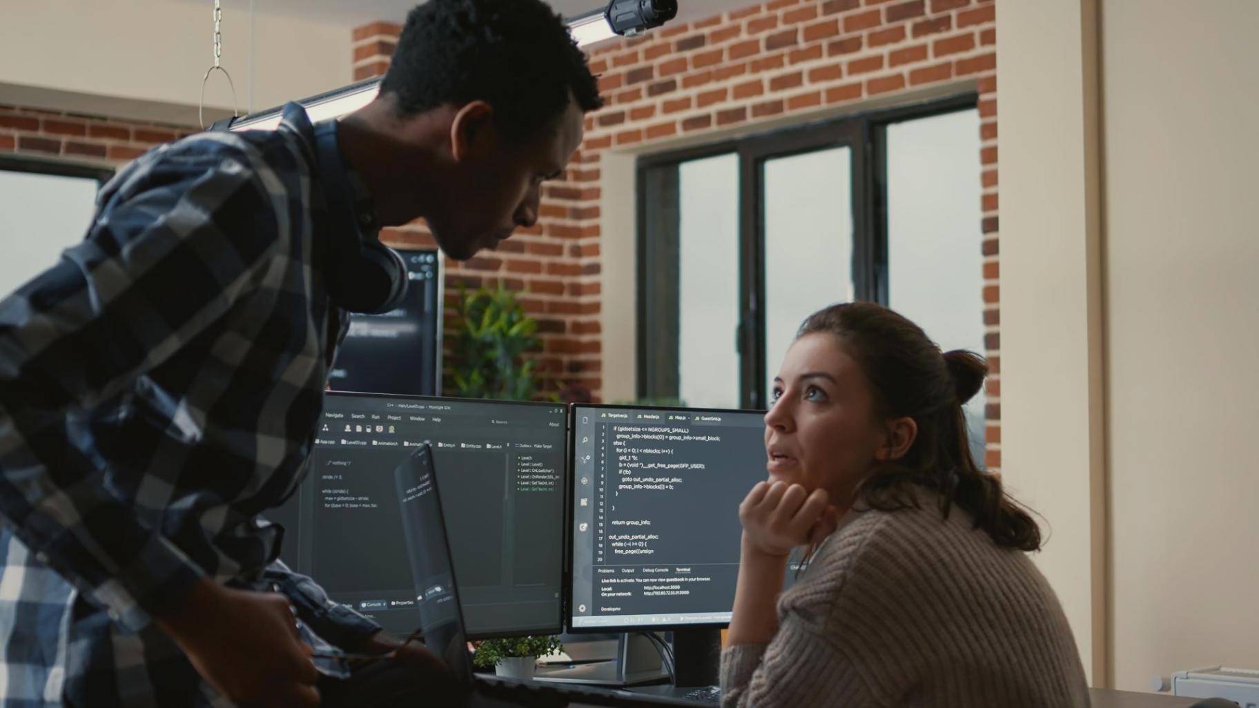 Developer working on mobile application architecture and code optimization